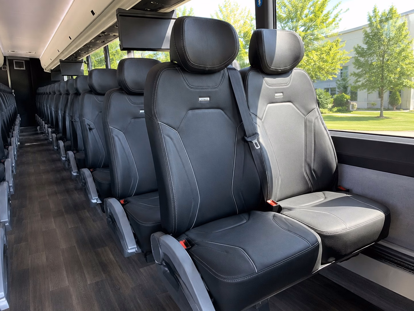 through a network of bus companies book hotel to venue shuttle buses for newark wedding guests